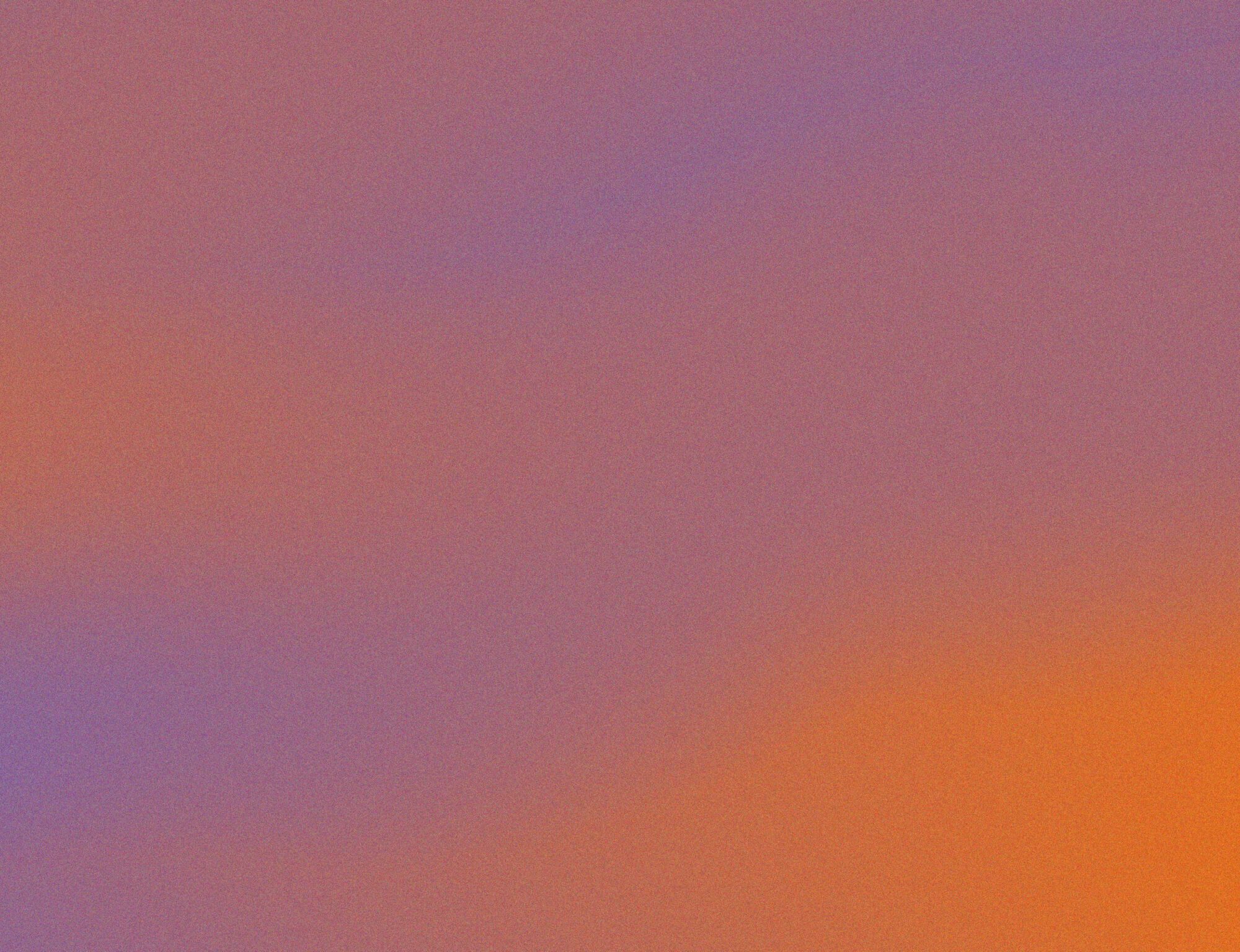 Grainy background orange and puprle gradient.